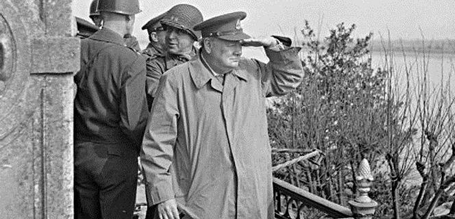 606px-Winston_Churchill_watching_Allied_vehicles_crossing_the_Rhine-credit-PD-US